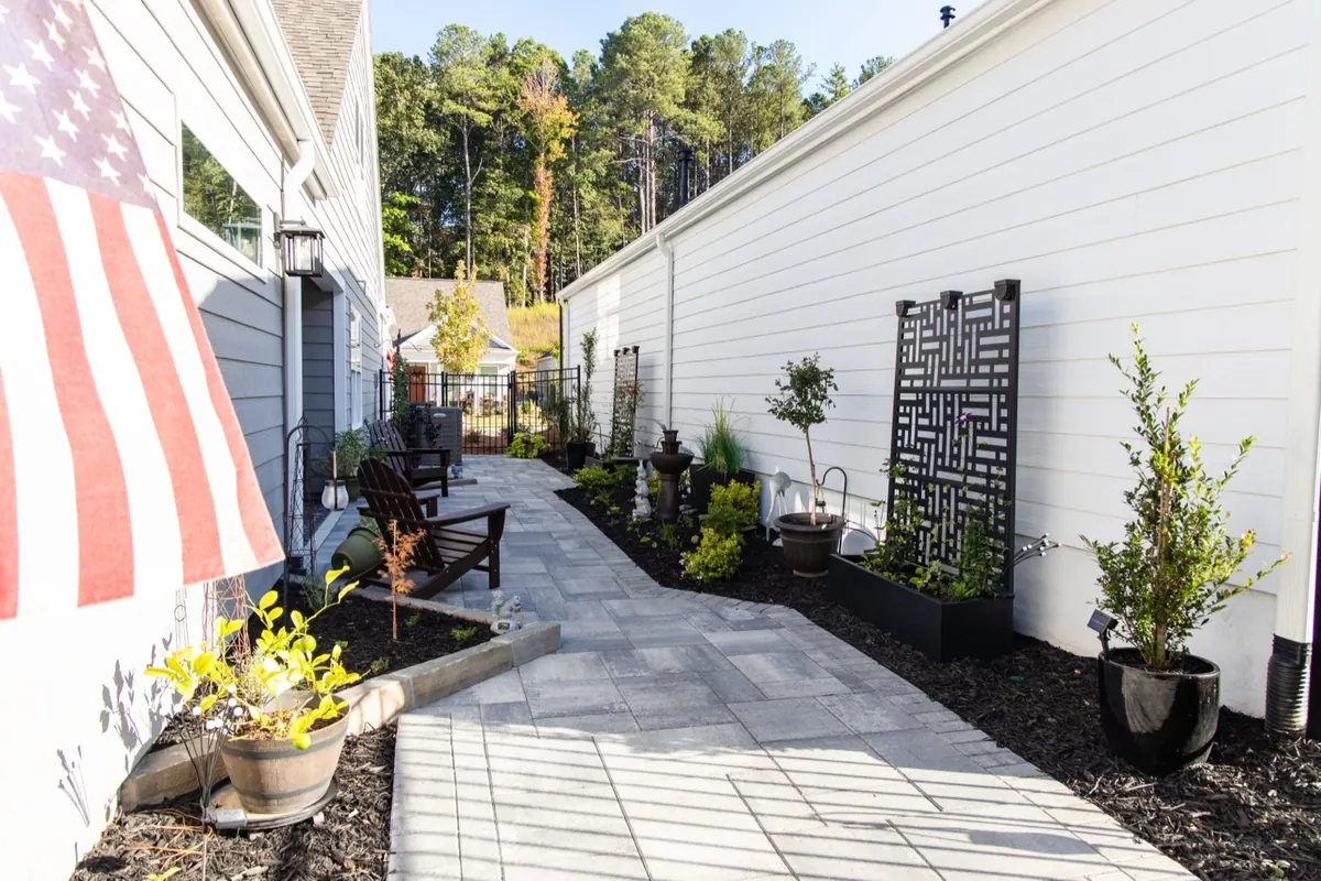 Covered porch and paver patio at the Avery project