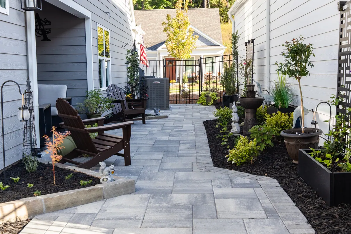 Planters and fresh plantings along the Avery paver passage