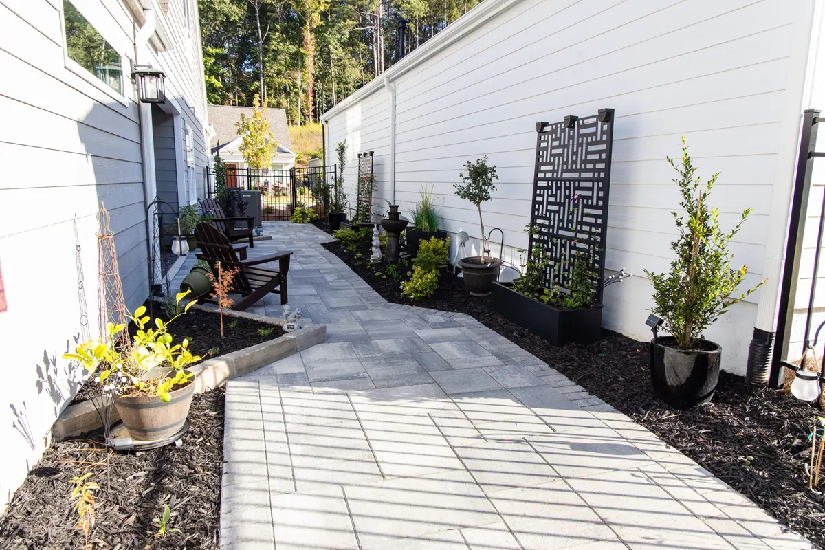 Planter beds and privacy screens along the Avery side passage