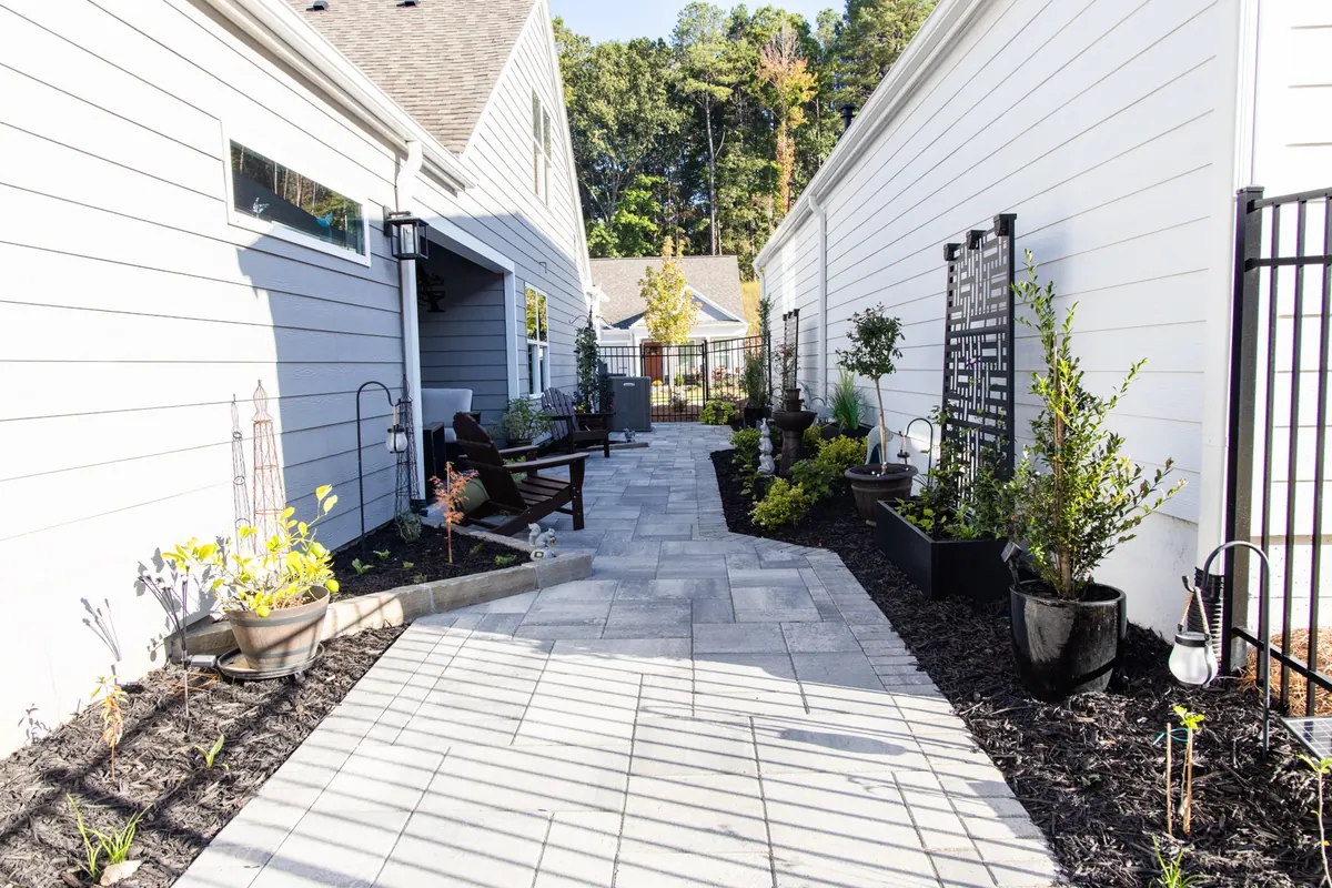 The long paver walkway at the Avery project
