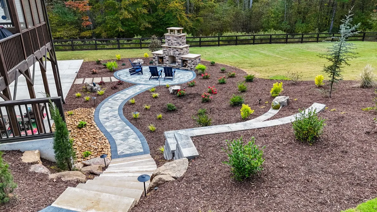 Finished paver path and fireplace patio at the Ball Ground project, seen from the deck