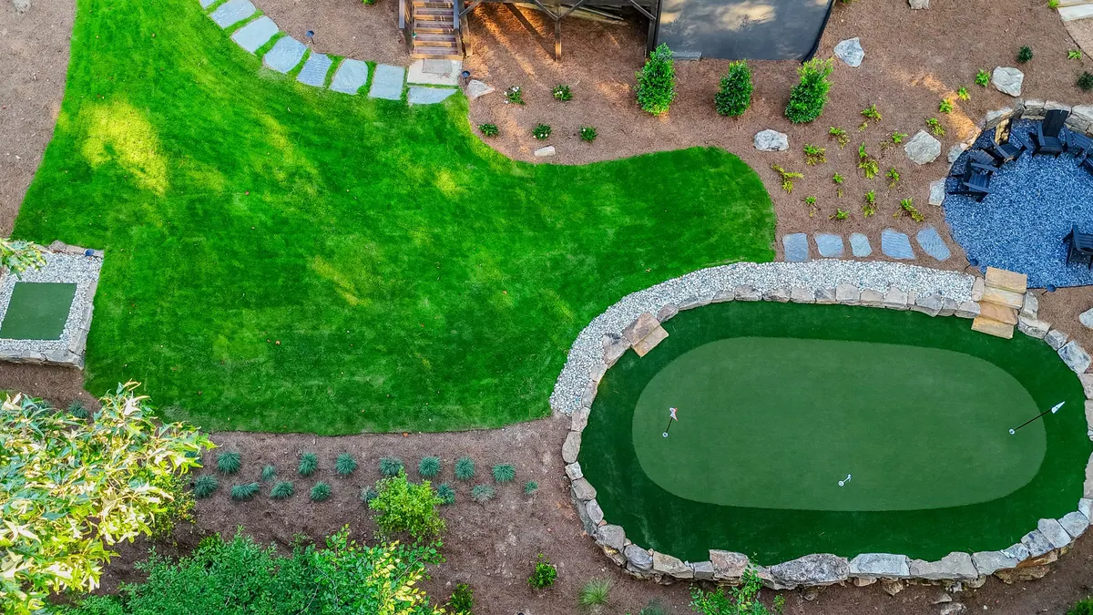 Drone view of the Blueberry Ridge putting green and fire-side seating terrace