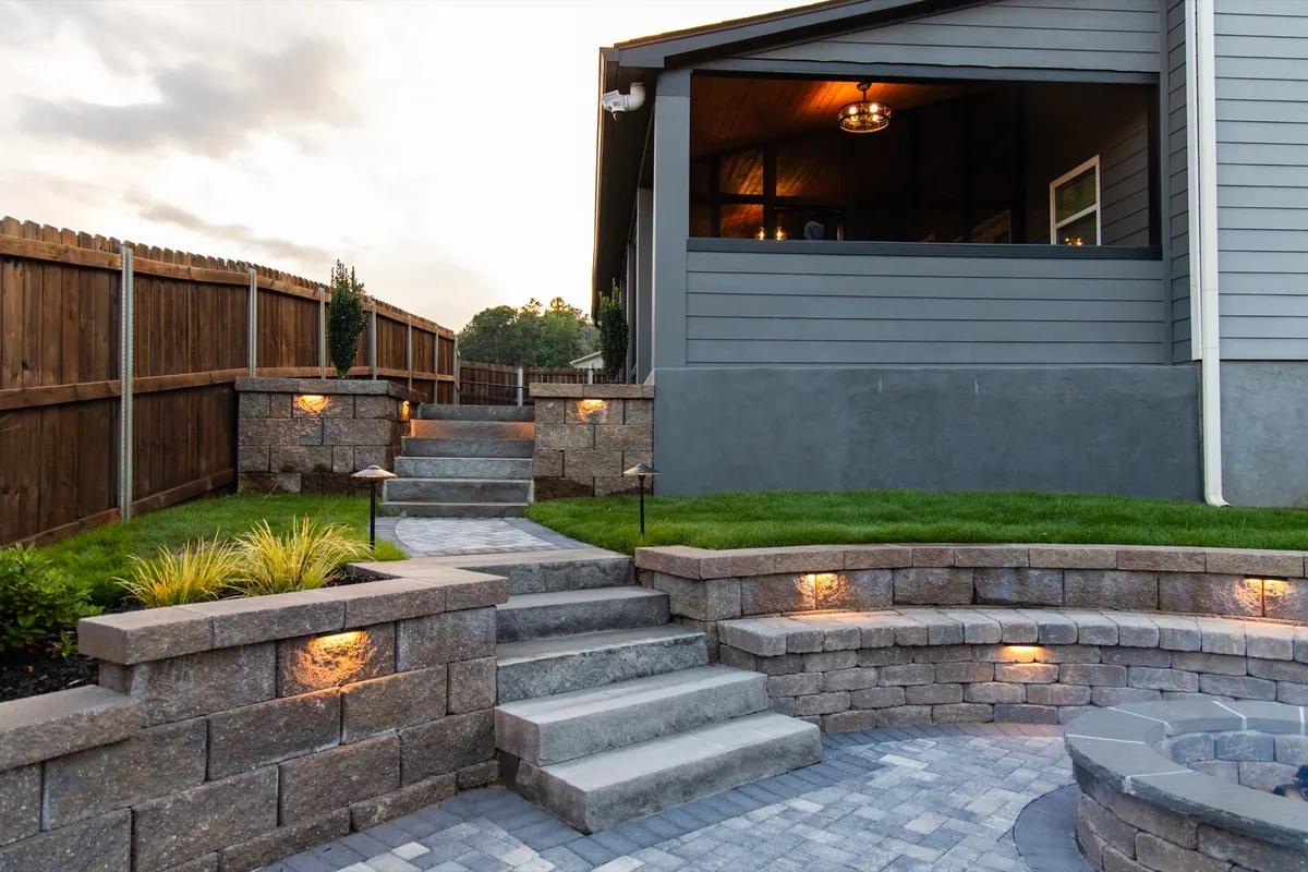 Retaining walls and steps under evening lighting at the Fulton Estate