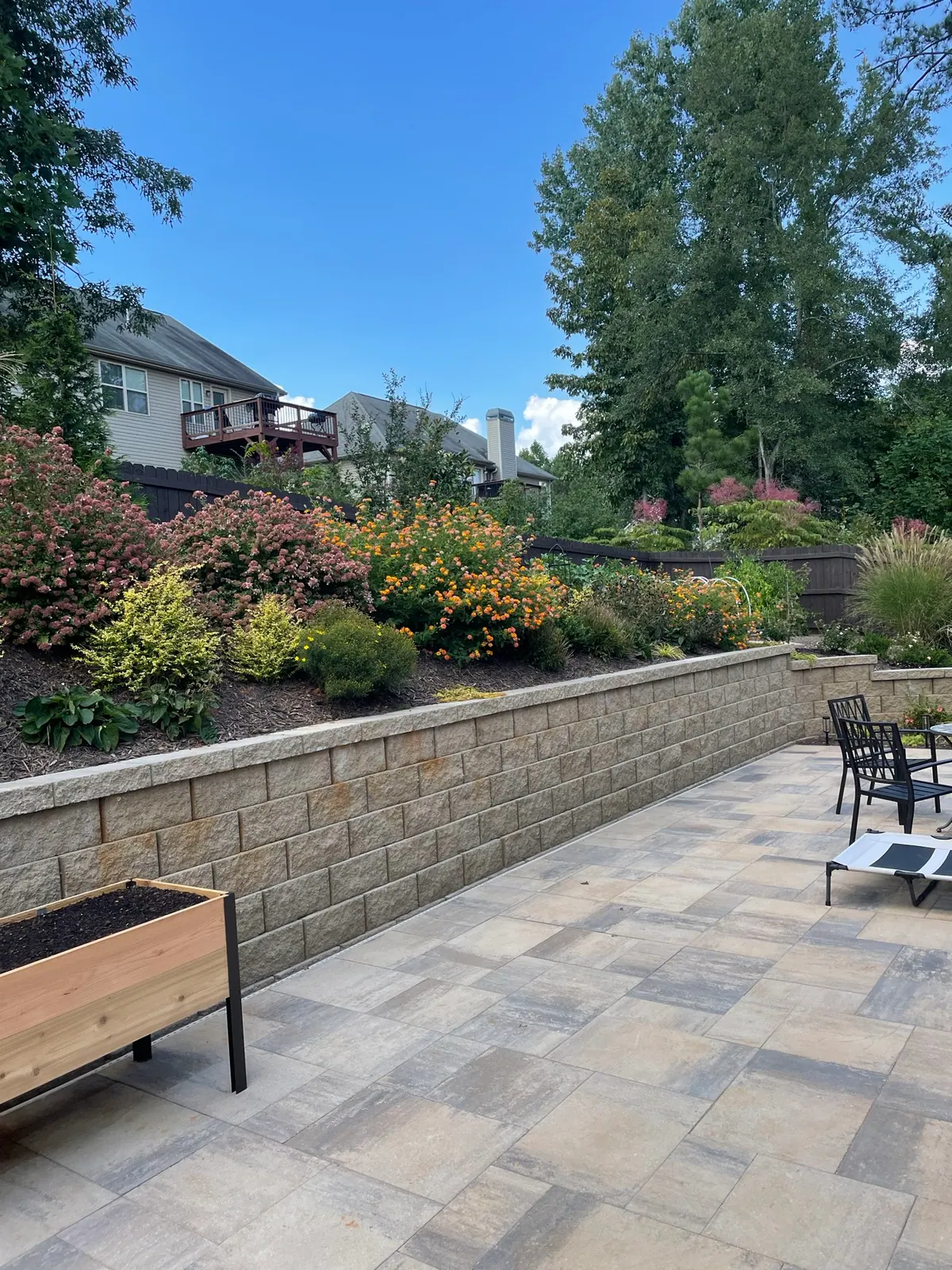 Stone wall and patio on a GreenTree build